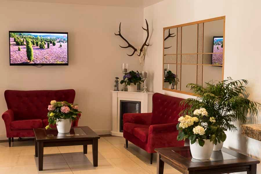 Empfangsbereich in dem Hotel Acht Linden in Egestorf