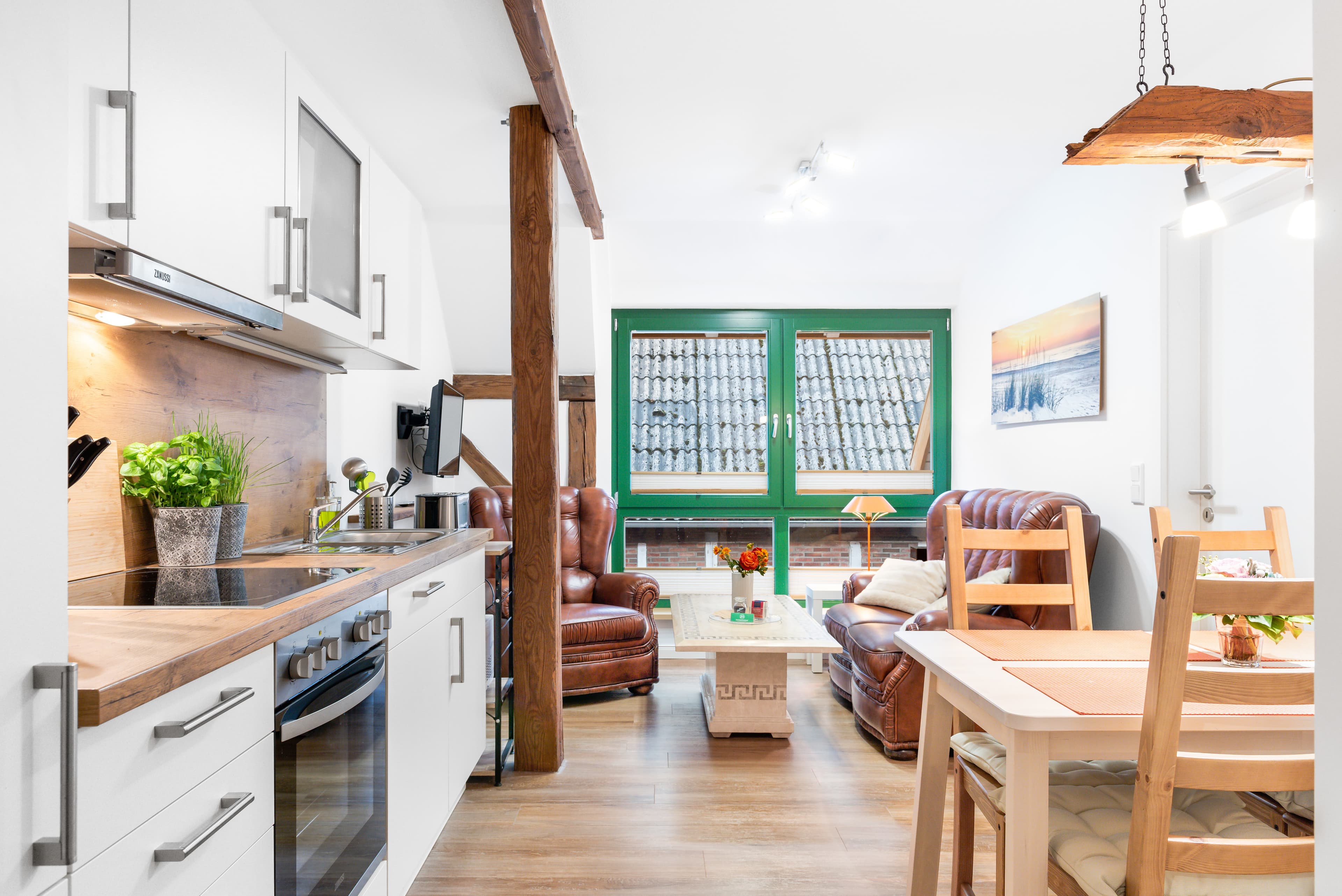 Das Wohn-/Esszimmer der Ferienwohnung Starkenweide auf dem Heitmannshof in Rosengarten